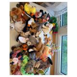 Beanie babies and Toy Story dolls as shown