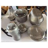 Aluminum serving pieces, most “Guardian Services”