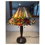 Lamp with rose floral stained glass style shade. 22' tall by 17' wide.