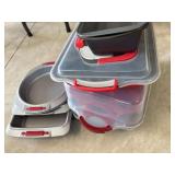 Lot of baking pans and covered kitchenware