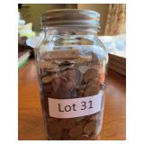 Jar of pennies. Some wheat. Not sorted or searched.