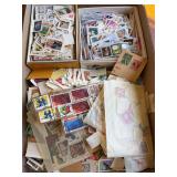 Lot of mostly all cancelled postage stamps from around the world