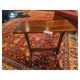 Ethan Allen wooden side table with traditional styling and lower shelf. Quality furniture piece suitable for living room, bedroom, or accent use. Shows light wear consistent with age and normal househ