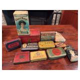 Vintage tobacco-related tins as shown. Includes assorted tobacco tins and related advertising containers with printed graphics and age-related wear. Decorative collectible group suitable for tobacco t