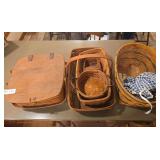 Six Longaberger baskets as shown. Assorted basket group with woven wood construction and traditional Longaberger styling, suitable for collecting, display, storage, gift baskets, or resale.