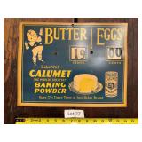 Calumet Baking Powder cardboard advertising sign with adjustable price dialers. Vintage-style kitchen and general store advertising piece with strong display appeal for baking, country store, and adve