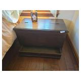 Antique wood storage chest or cabinet with hinged top, drop-front compartment, interior shelves, and lower drawer. Features iron side strapping, side handle, and aged wood finish. Measures approximate
