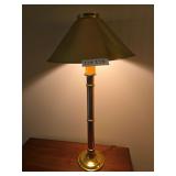 Three brass-style table lamps with traditional decorative bases. Assorted lighting group suitable for side tables, nightstands, console tables, or accent furniture.
