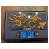 Approximately .32 ounces of 14KT gold as shown. Assorted 14KT gold jewelry / scrap gold group. This lot cannot be shipped and must be paid for in cash.