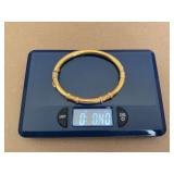 Small 18kt gold bracelet. Has some dents. Approximately .40 ounce. Marked “Italy 750”. This lot cannot be shipped and must be paid for in cash.