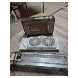 Vintage Sears Electric Heaters & Holmes Window Fan. Includes two electric space heaters, including a long Sears radiant-style heater, together with a Holmes twin-blade window fan; untested.