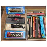 2 flats of HO scale engines and cars