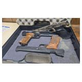 Three BB/pellet pistols in foam-lined hard case, including a chrome-finish Daisy Power Line 41 CO2 pellet pistol marked .177 cal./4.5mm, a Daisy target-style pistol marked Rogers, Arkansas, USA with w