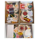 Three flats of firearm-related patches, stickers and decals including Marlin, Federal, NRA, Northwestern Ohio Volunteer Firemen’s Association, aviation-related pieces and other shooting-sports adver