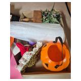 Vintage Halloween & Holiday Decorations. Mixed seasonal grouping includes orange jack-o’-lantern trick-or-treat bucket, fabric witch decoration, artificial floral pieces and assorted holiday/decorat