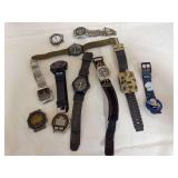 Group of assorted men’s, sport and novelty watches including analog and digital examples, Coleman watches and a Casper character watch. Includes expansion-band, fabric-strap and resin-strap styles a