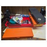 Gun cleaning set and stand with assorted cleaning rods, accessories and fitted cases, including Hoppe’s-branded components as shown.