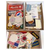 Three flats of firearm-related patches, stickers and decals featuring Marlin, Federal, Springfield Armory, Harrington & Richardson, NRA and other shooting-sports brands and organizations as shown. Mix