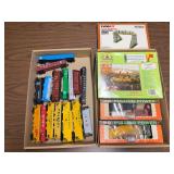 2 flats of HO scale train cars