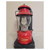 Coleman Model 200A Red Lantern with Case – Marked 4/58. Red single-mantle pressure lantern with matching red porcelain ventilator, clear globe and fitted black carrying base/case; shows age-related 