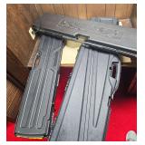 Three molded hard long gun cases in assorted styles, including foam-lined interiors and molded carrying handles. Cases are empty as shown.
