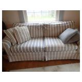 Blue/gray and white striped couch