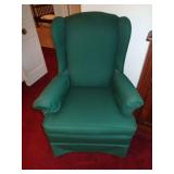 Green upholstered wing chair