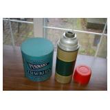 Old tin can and thermos