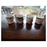 4 decorative mugs as shown