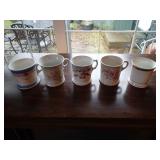 5 decorative mugs as shown