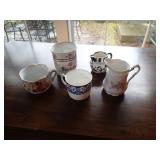 5 decorative mugs as shown