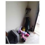 Golf clubs, TV, kid