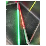 2 new light sabers - 28in long  - various color