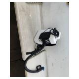 Some type of Back Pack Sprayer.   it