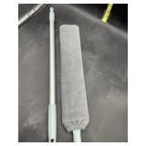 Retractable dust collector