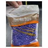 Hard wax beans used for hair removal - lavender