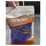 Hard wax beans used for hair removal - lavender