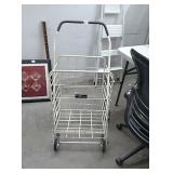 Metal rolling hauling cart. Folds up for storage