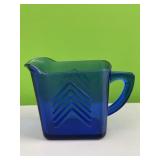 Blue glass creamer
