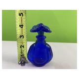 Blue glass perfume bottle