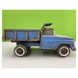 Blue metal tonka dump truck
