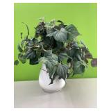 Vitreous white pitcher with floral arrangement