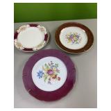 3 red and white plates