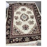 8ft x 5.5ft brown and white rug