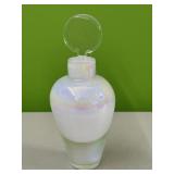 White iridescent perfume bottle