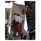 Large tree skirt with two matching stockings,