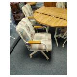 Table & 4 Chairs on Rollers. Very Nice Set (Betty