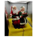 Animated Mr & Mrs Santa Clause. On a Bench. Works