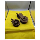 2 Antique Pulleys. Larger one has  Wood Center