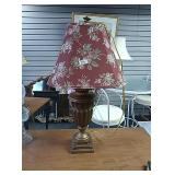 Gold colored lamp with burgundy floral shade